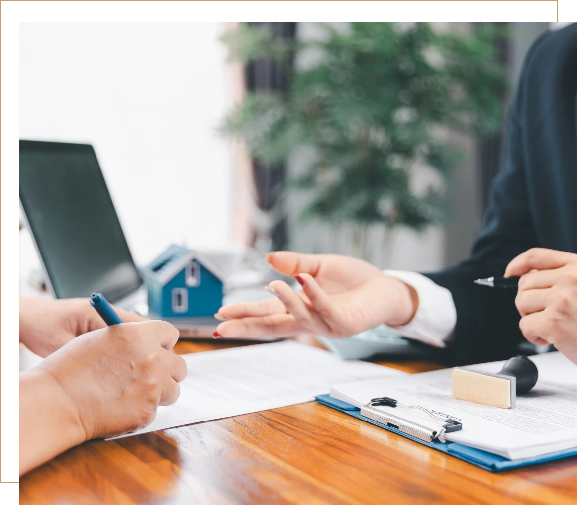 Business meeting with paperwork and laptop