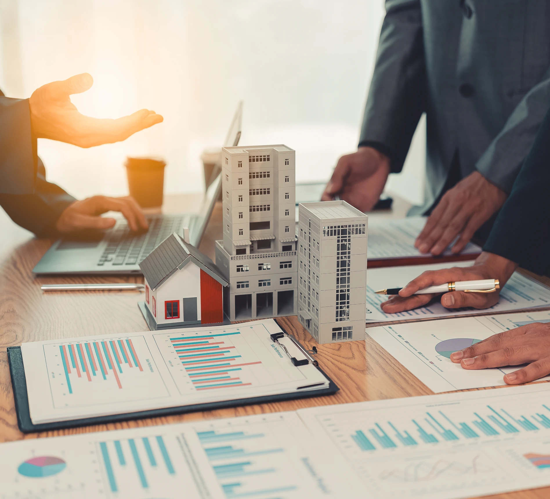 Team discussing project over charts